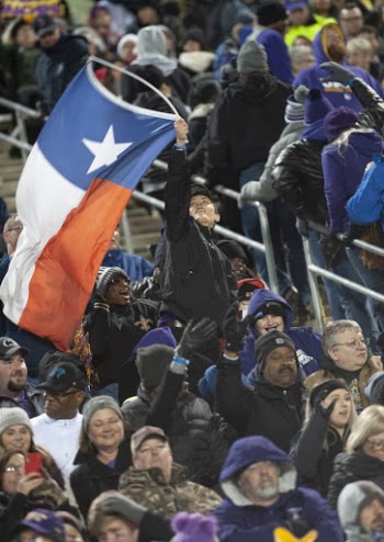 Man Waving Red, Blue, and White With Star Flag Surrounded With People