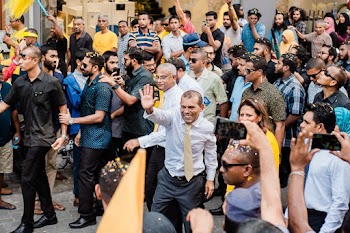 Man Waving To The People