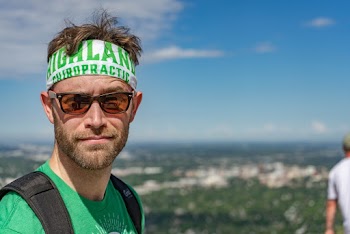Man wearing a bandana  and sunglasses