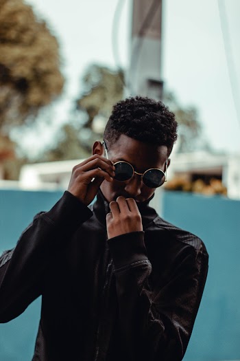 Man Wearing A Black Jacket 