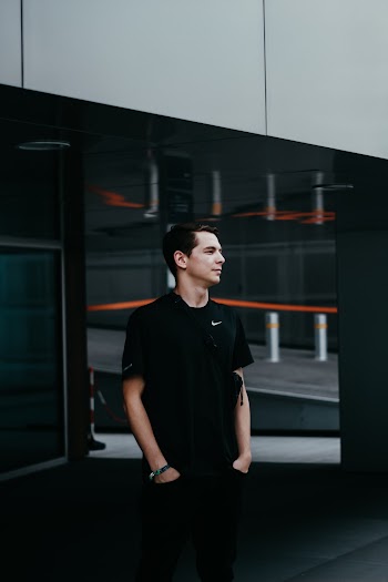 Man Wearing a Black Nike Crew-neck T-shirt