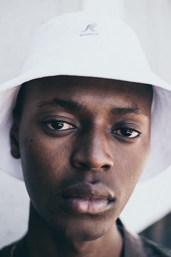 Man Wearing A Bucket Hat