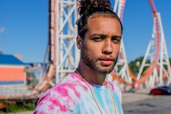 Man Wearing A Colorful Tie-Die T-shirt