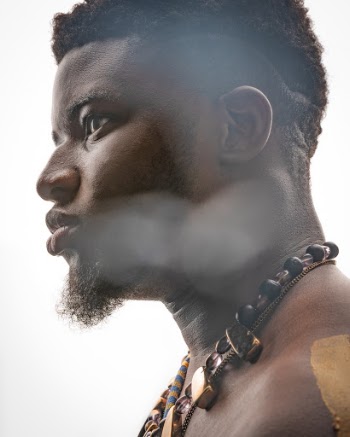 Man Wearing A Necklace