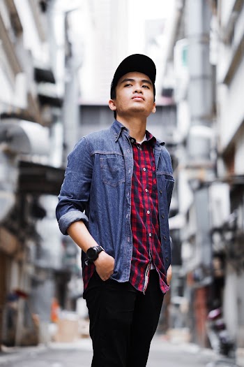 Man Wearing A Plaid Shirt With Denim Outerwear