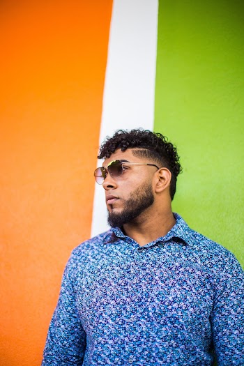 Man Wearing Aviator-style Sunglasses and Blue and White Button-up Long-sleeved Shirt