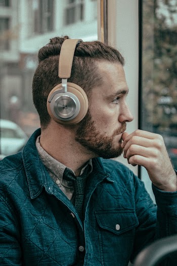 Man Wearing Beige Headphones