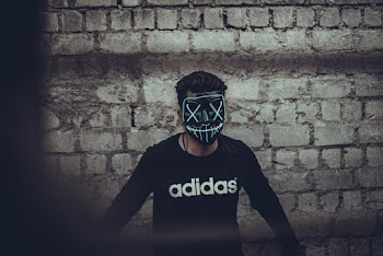 Man Wearing Black Adidas Long Sleeve Shirt And Mask