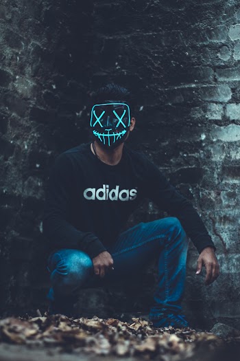 Man Wearing Black Adidas Long Sleeves And Blue Denim Jeans