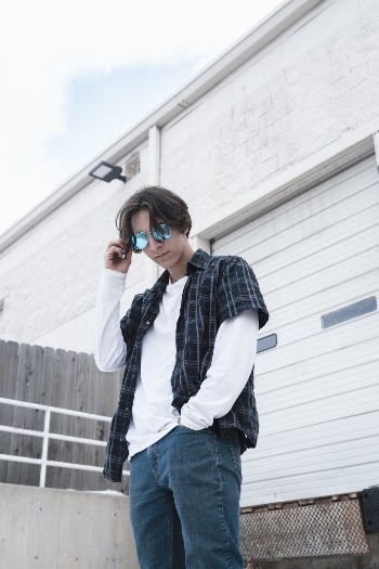 Man Wearing Black and Blue Plaid Dress Shirt