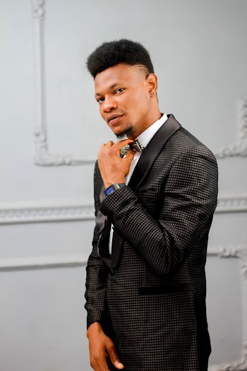 Man Wearing Black and Grey Striped Blazer