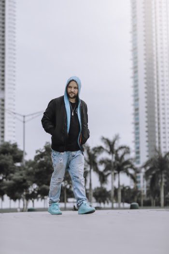 Man Wearing Black And Teal Hoodie Jacket