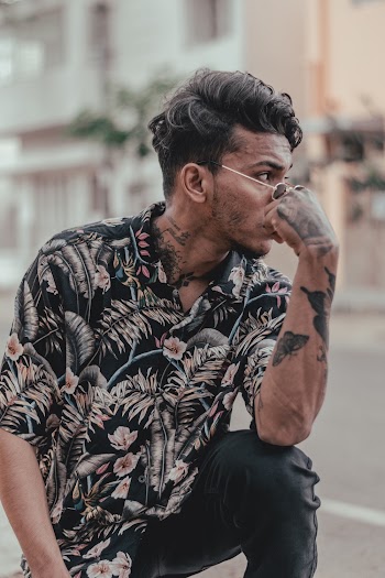 Man Wearing Black and White Paisley Dress Shirt