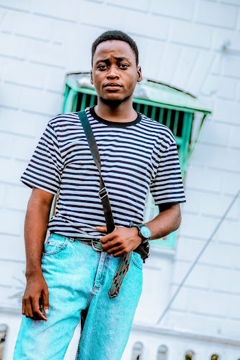 Man Wearing Black and White Striped T-shirt