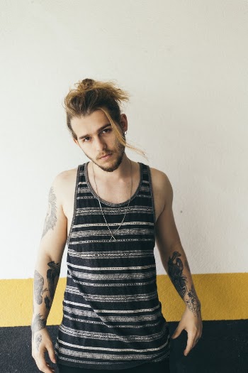 Man Wearing Black and White Striped Tank Top