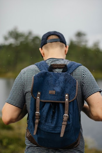 Man Wearing Black Backpack