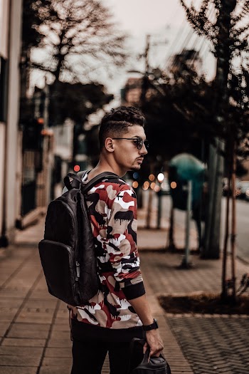 Man Wearing Black Backpack