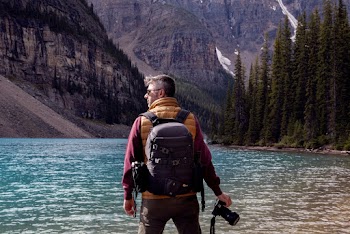 Man Wearing Black Backpack