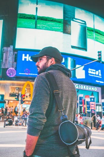 Man Wearing Black Cap