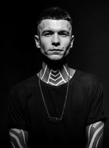 man wearing black crew-neck shirt