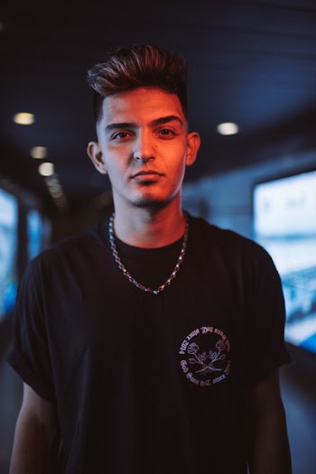 Man Wearing Black Crew-neck T-shirt