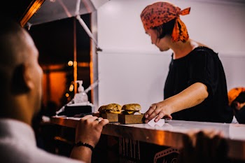 Man Wearing Black Crew Neck T-shirt And Handkerchief Cap 