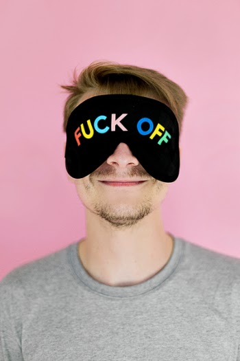 Man Wearing Black Eye Mask