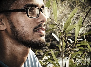 Man Wearing Black Framed Eyeglasses