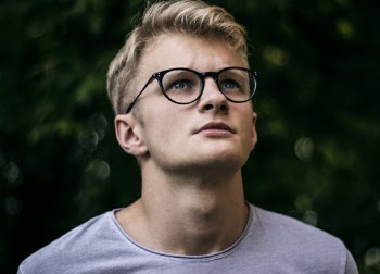 Man Wearing Black Framed Eyeglasses