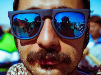 Man Wearing Black Framed Sunglasses