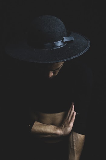 Man Wearing Black Hat