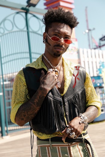 Man Wearing Black Leather Collared Vest