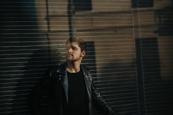 Man Wearing Black Leather Jacket
