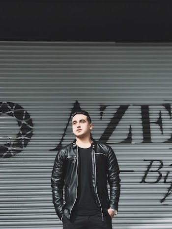 Man Wearing Black Leather Jacket