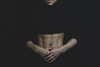 Man Wearing Black Long-sleeved Crop-top