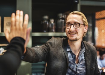 Man Wearing Black Notched Lapel Blazer