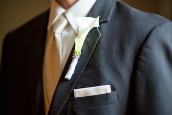 Man Wearing Black Notched Lapel Suit Jacket in Selective Focus Photography