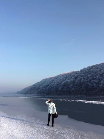 Man Wearing Black Pants Standing on Beach Shore