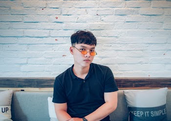 Man Wearing Black Polo Shirt