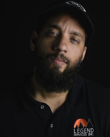 Man Wearing Black Polo Shirt