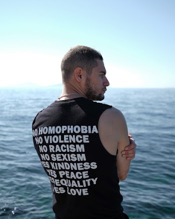 Man Wearing Black Sleeveless Top