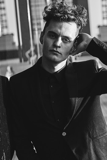 Man Wearing Black Suit