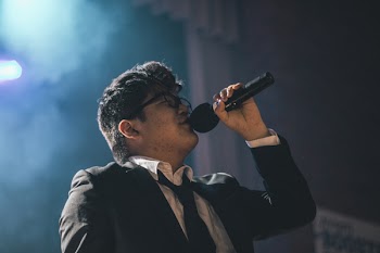 Man Wearing Black Suit Jacket