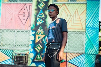 Man Wearing Black T-shirt and Pants