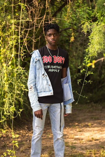 Man Wearing Black T-shirt, Denim Jacket and Jeans 