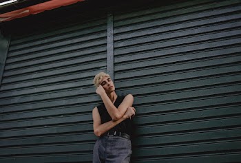 Man Wearing Black Tank Top
