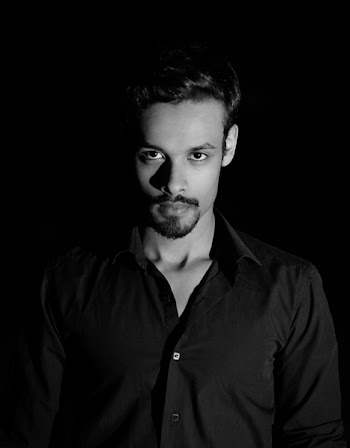 Man Wearing Black Top 