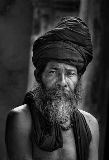 man wearing black turban hat
