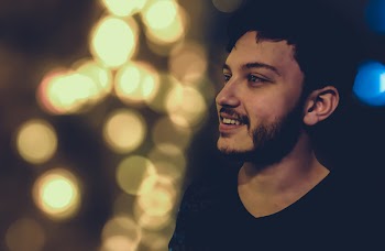 Man Wearing Black V-neck Shirt
