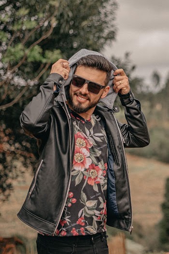 Man Wearing Black Zip-up Hooded Jacket